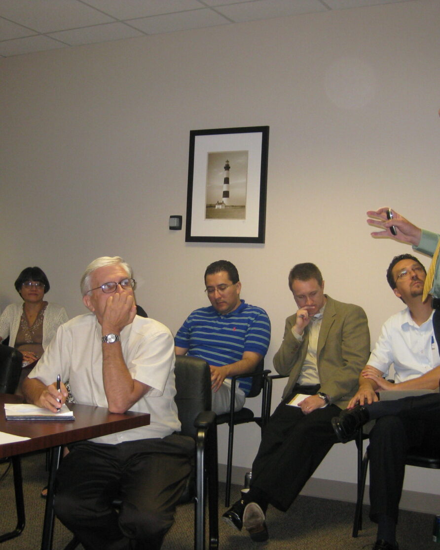 Damir Novosel, founder, speaks at company all hands meeting in a conference room in 2009.