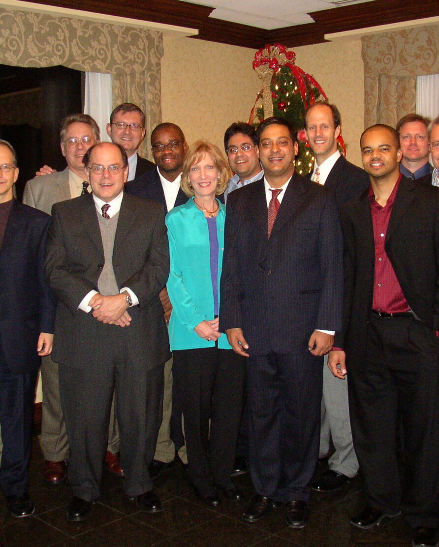Group of employees at a professional holiday party in 2006.