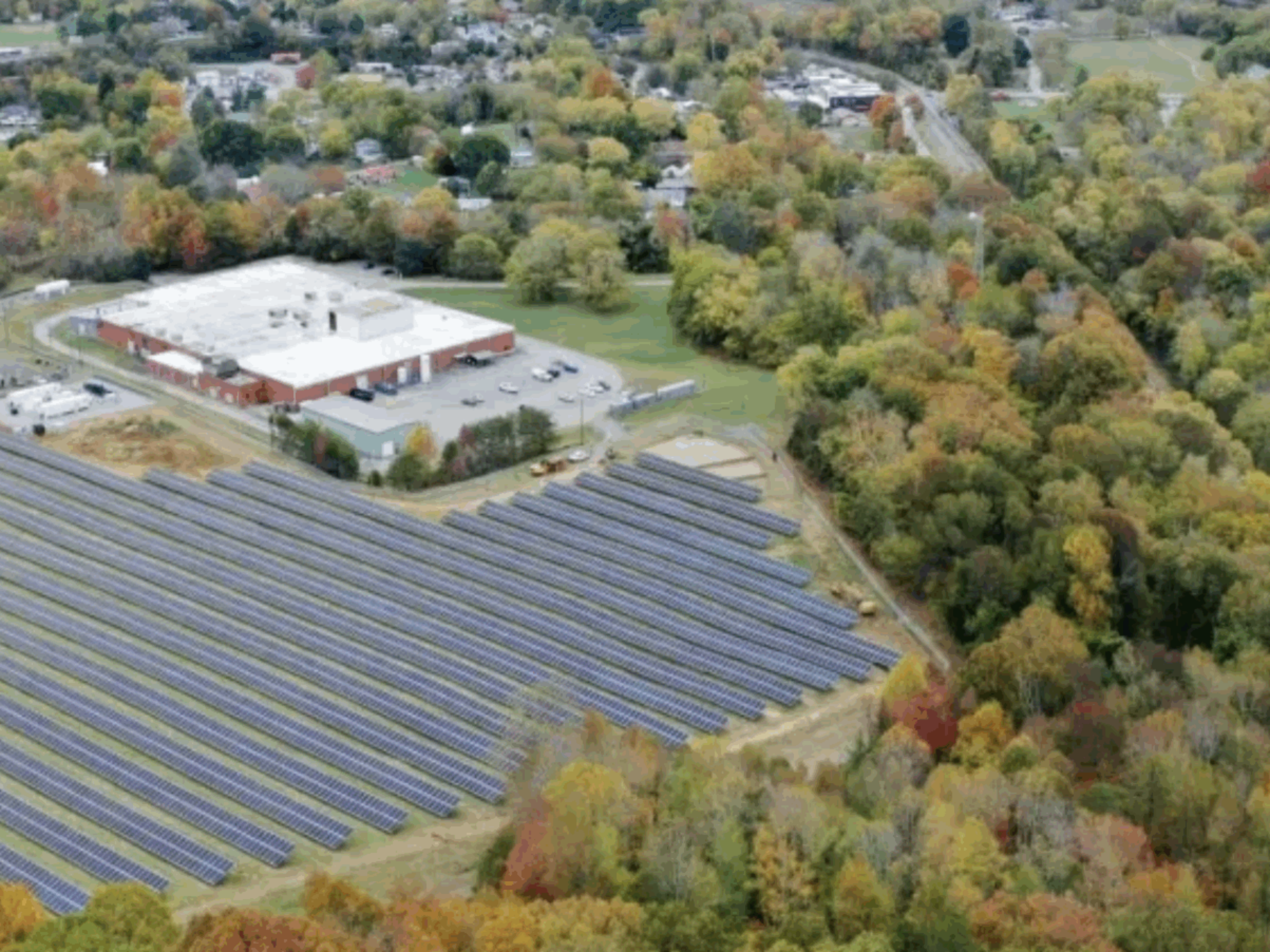 Microgrid surrounded by fall trees in Hot Springs, NC.