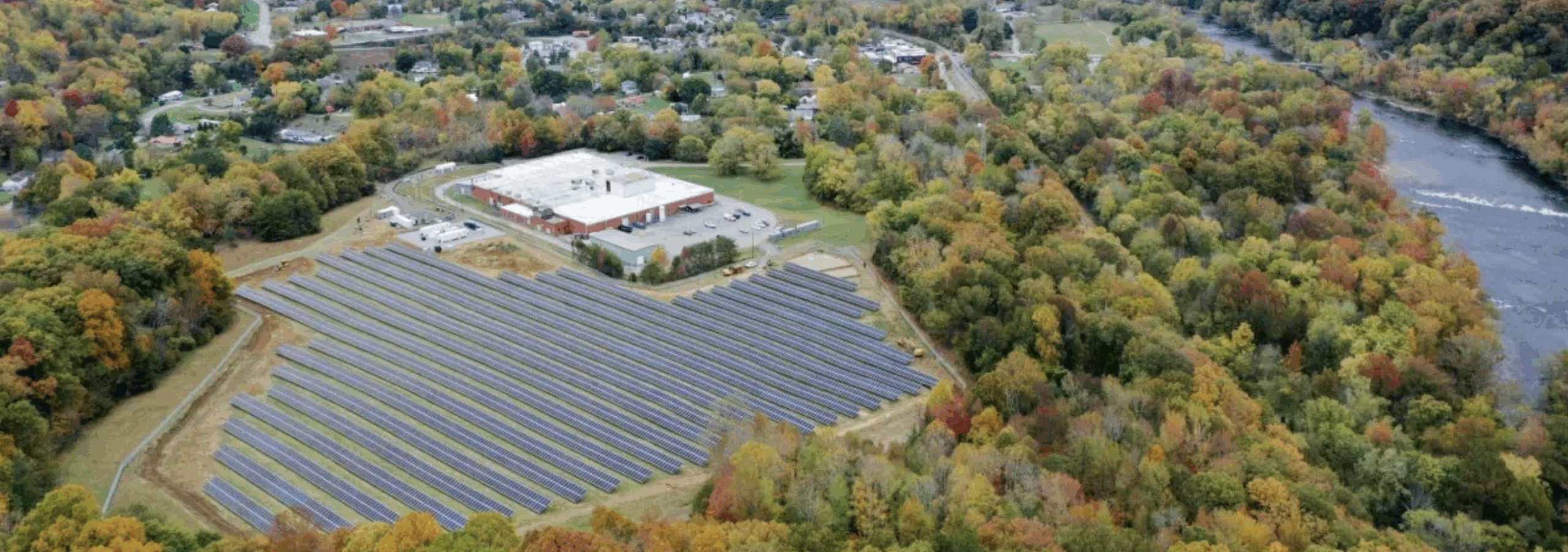 Microgrid surrounded by fall trees in Hot Springs, NC.