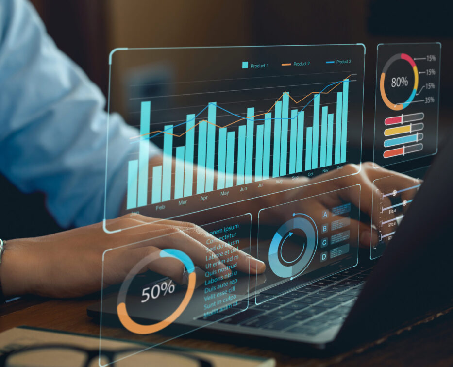 Analyst Works on Personal Computer Showing business analytics dashboard with charts, metrics and KPI to analyze performance and create insight reports for operations management. Data analysis concept.