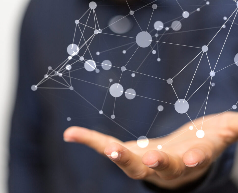 Hand holding an interconnected system.