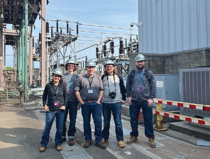 Group photo at electrical substation