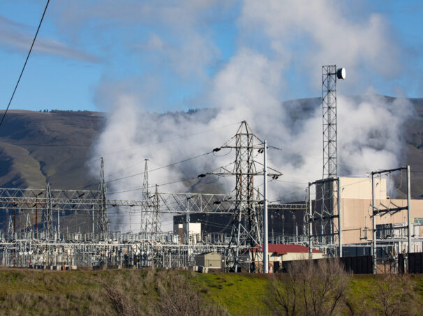 High voltage electrical power substation and transmission infrastructure beside a major data center campus